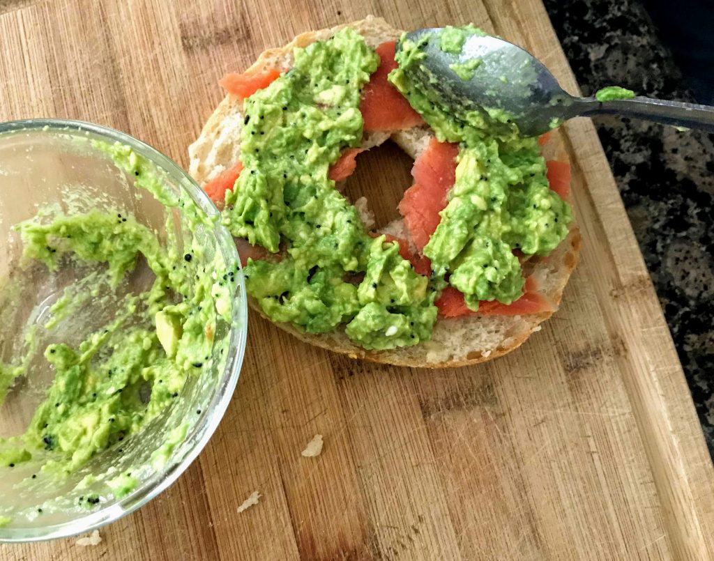 Sourdough bagel with avocado and lox