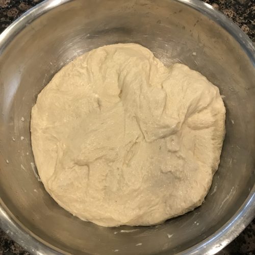 Initially, the dough is very sticky and wet